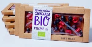 Czekolada mleczna z czarnymi porzeczkami i malinami Bio 53g